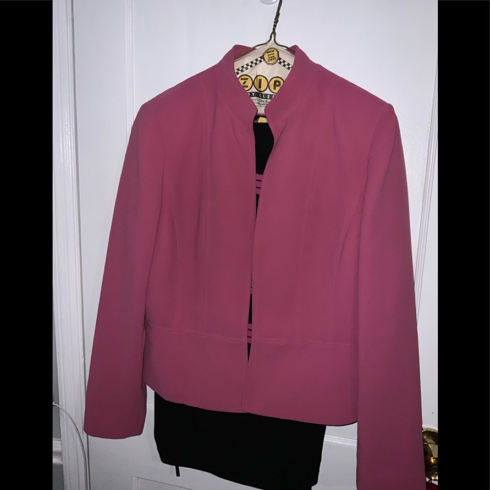 A pink and black pants and jacket suit